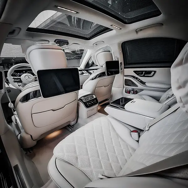 luxury s class interior in white color with displays and tablet