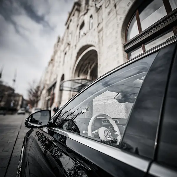 side view of hotel and mercedes benz s class